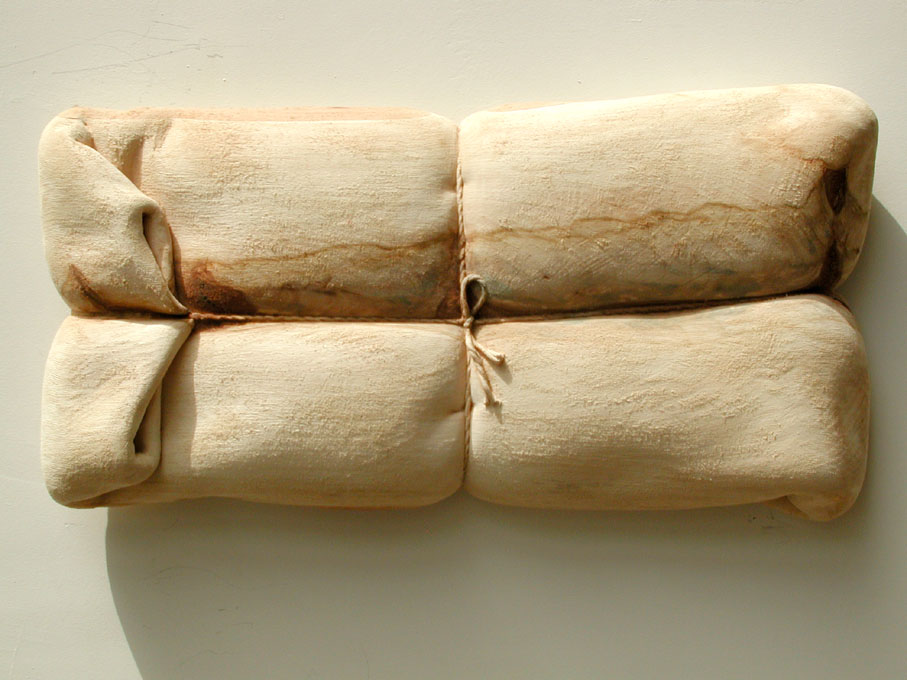 Couverture et ficelle en croix