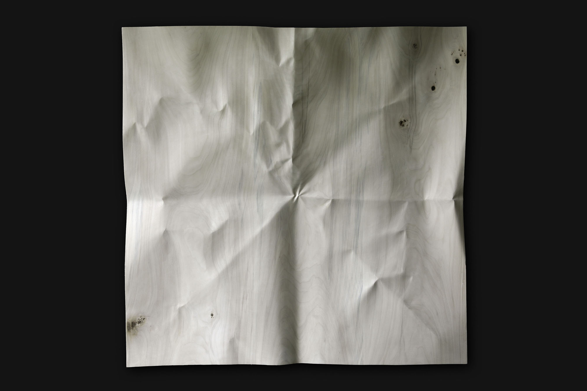 Papier déplié, quatre plis et diagonales